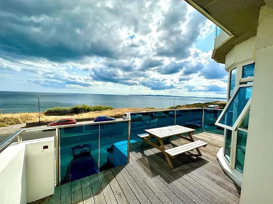 Seaside Panorama Retreat: Beachfront Comfort for Four-1